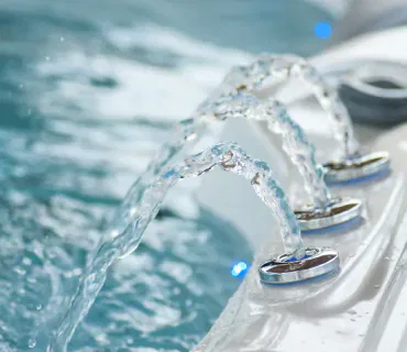 jets of water streaming into a spa pool